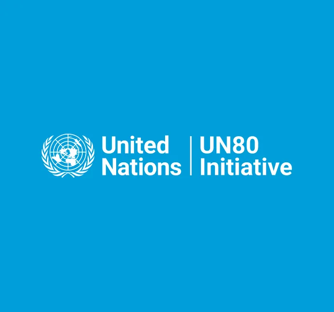 The same UN80 Initiative lockup reversed out in white on UN blue